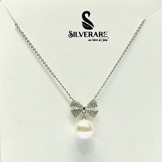 STERLING SILVER HALLMARKED ZIRCON BOW WITH PEARL DROP PENDENT WITH CHAIN