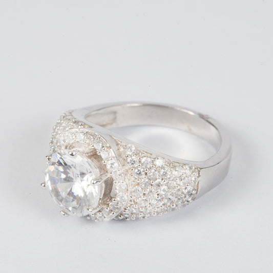STERLING SILVER HALLMARKED SINGLE SOLITARE SURROUNDED WITH SMALL CUBIC ZIRCONIA WOMEN'S RING