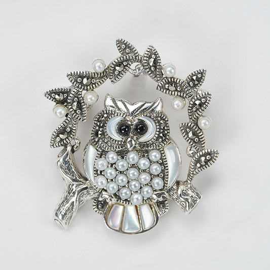 silver owl brooch with pearls and mother of pearls