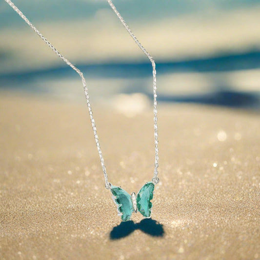 BEAUTIFUL SEAGREEN BUTTERFLY STUDDED WITH ZIRCON PENDANT WITH SILVER CHAIN