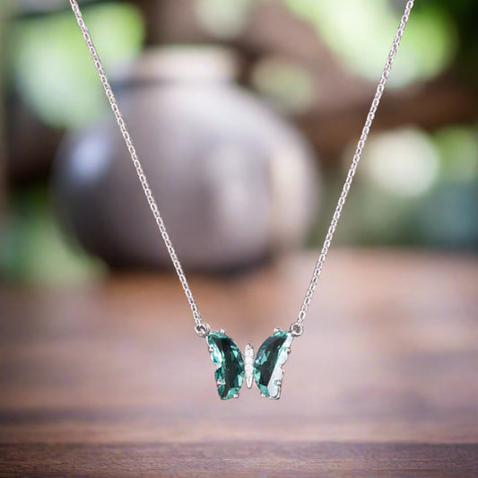 BEAUTIFUL SEAGREEN BUTTERFLY STUDDED WITH ZIRCON PENDANT WITH SILVER CHAIN