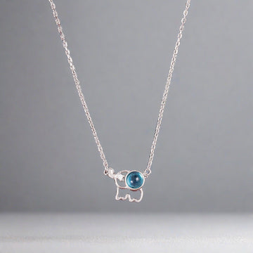 CUTE ELEPHANT WITH BLUE STONE