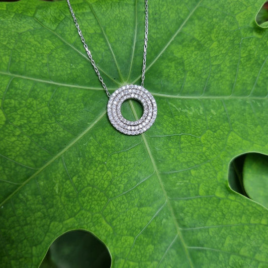 Sterling silver round patterned zirconia pendent and chain