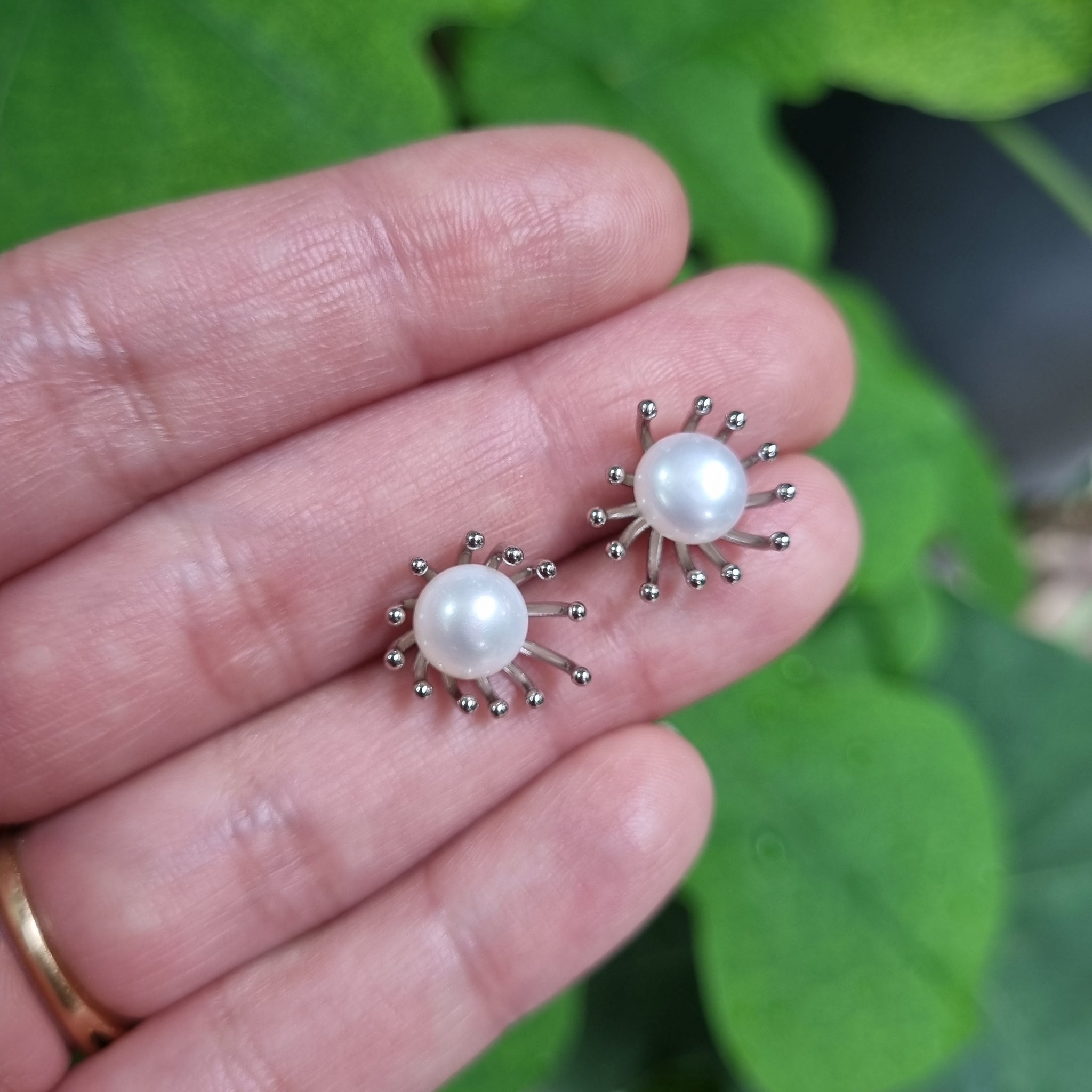 Sterling silver splish splash earrings with pearl in center