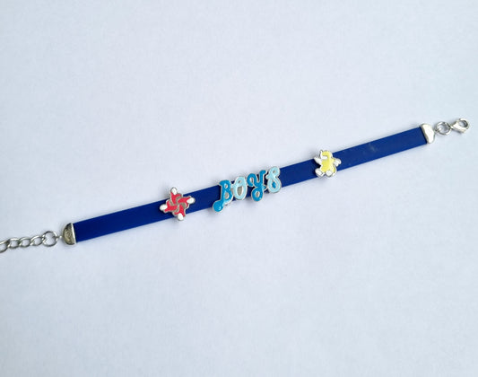 STERLING SILVER BOYS BLUE BRACELET WITH SWASTIK AND CUTE CHARM