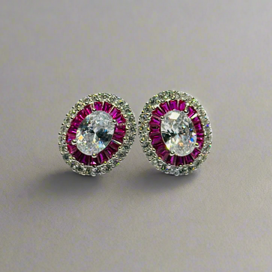 Sterling silver pair of Ruby and zircon oval studs