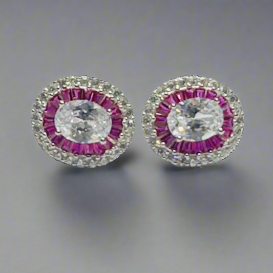 Sterling silver pair of Ruby and zircon oval studs