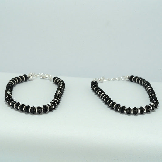 silver kid's anklet with black beeds