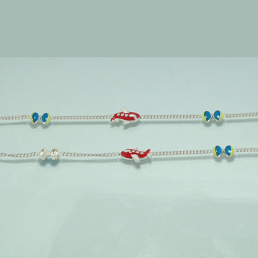 silver bow with aeroplane pattern kid's anklet with red white green blue enamel