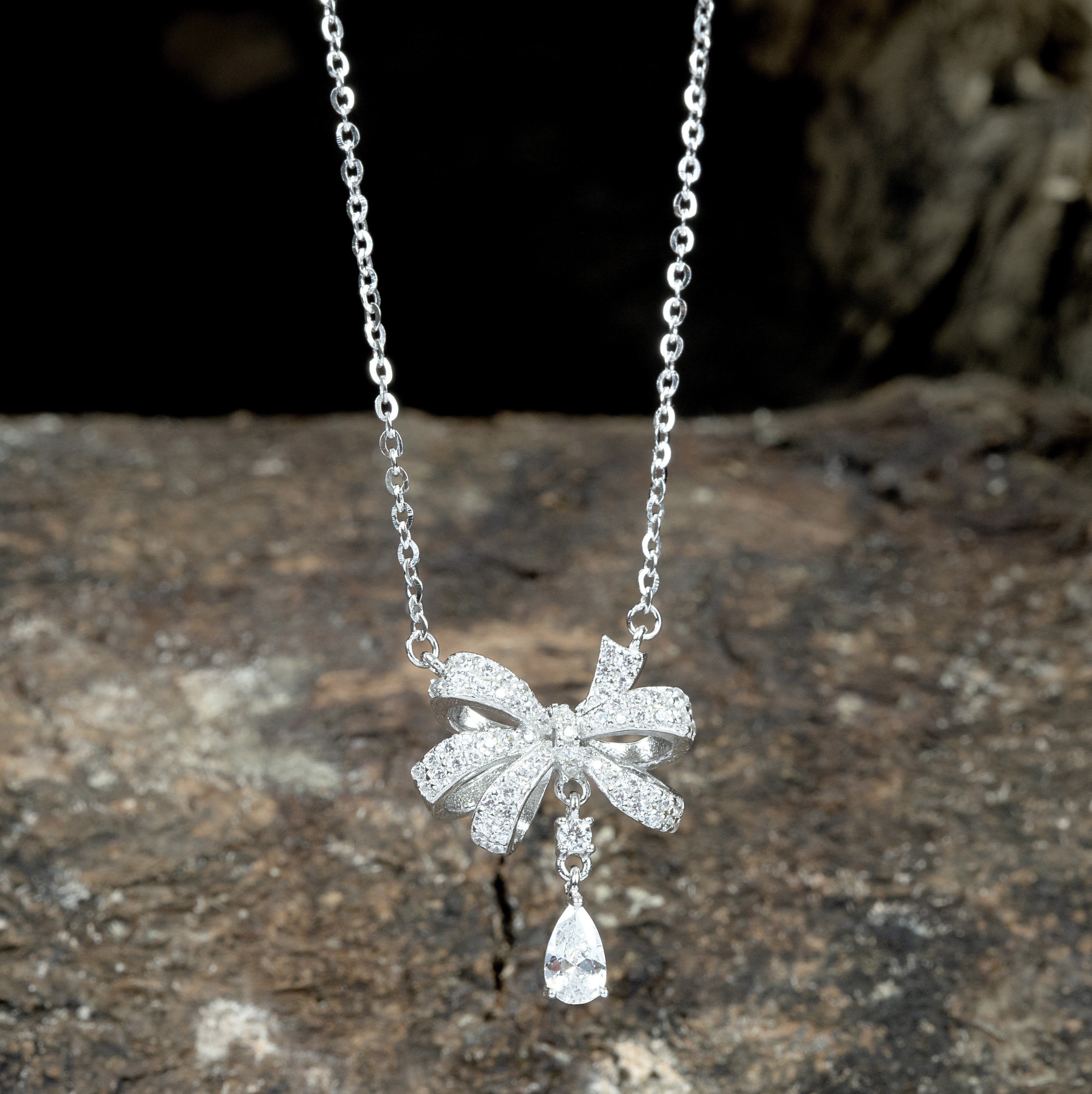 Silver Bow & Pear Zircon Pendant