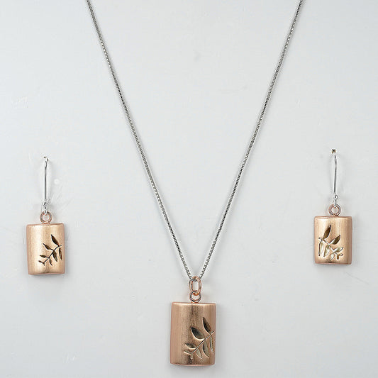 silver chain set with carved leaf on matt rose gold polish