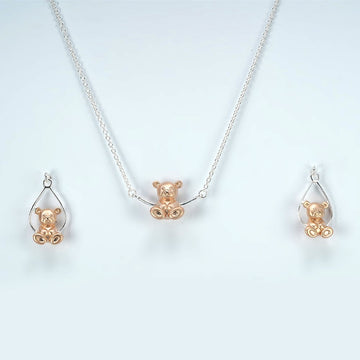 silver chain set with rosegold plated cute little swinging teddy pendent set