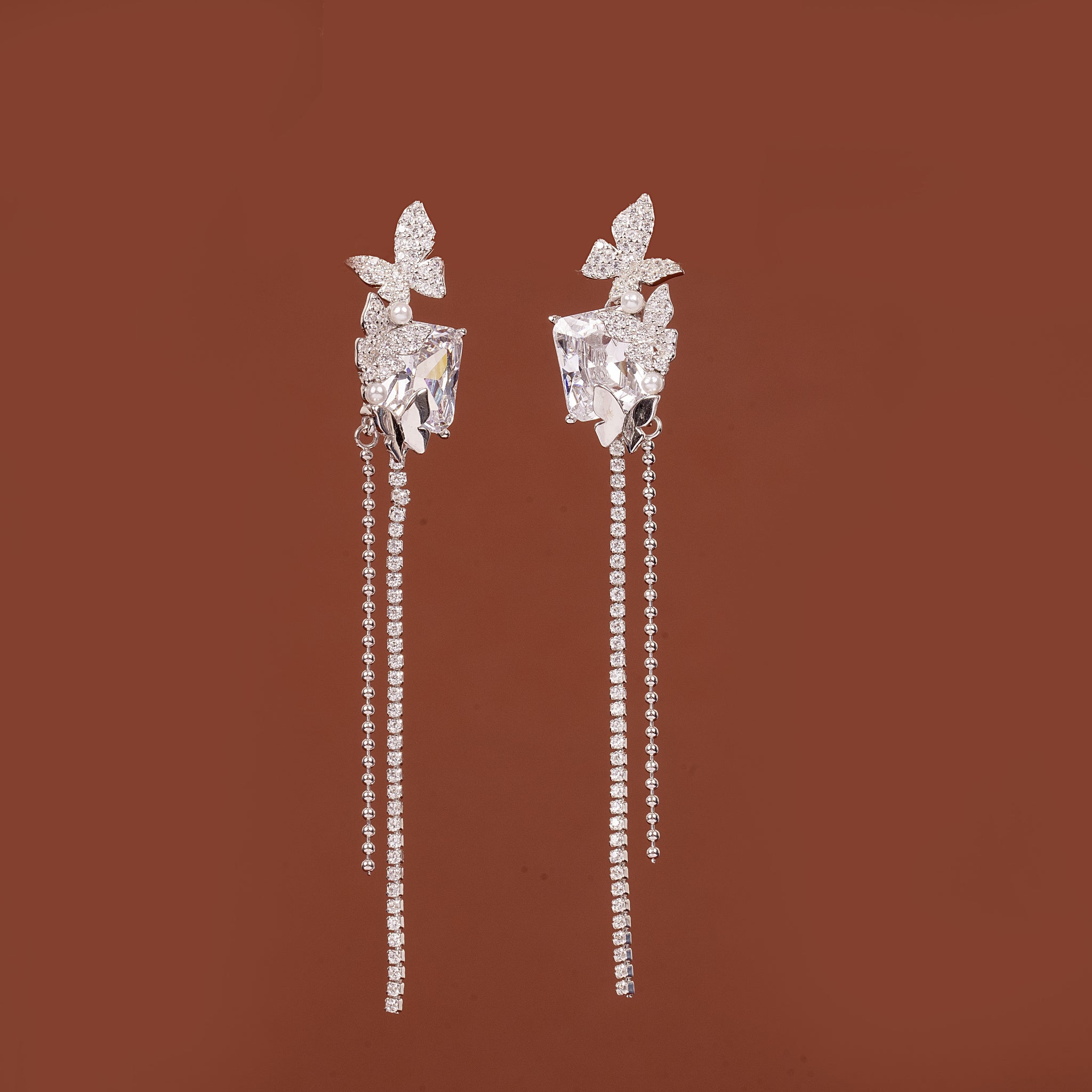 STERLING SILVER BEAUTIFUL ZIRCON STUDDED BUTTERFLY ON SINGLE PRINCESS CUT SOLITARE EARRINGS