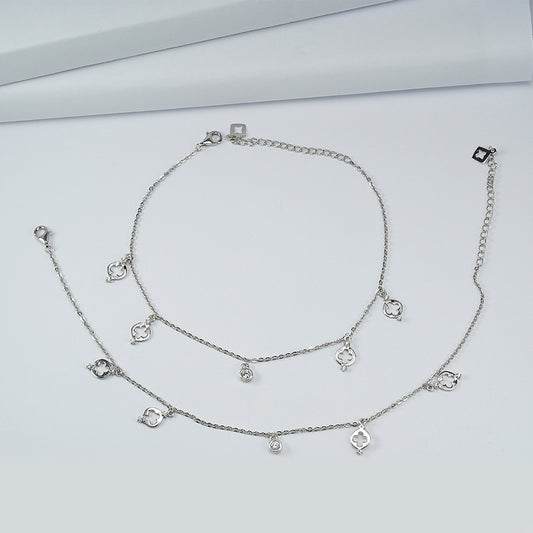 silver tiny charm anklet studded with zircon