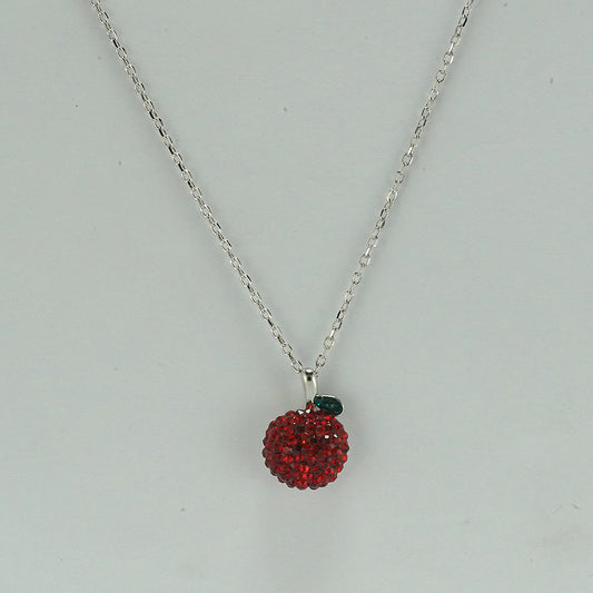 silver necklace with apple pendant studded with red zircon